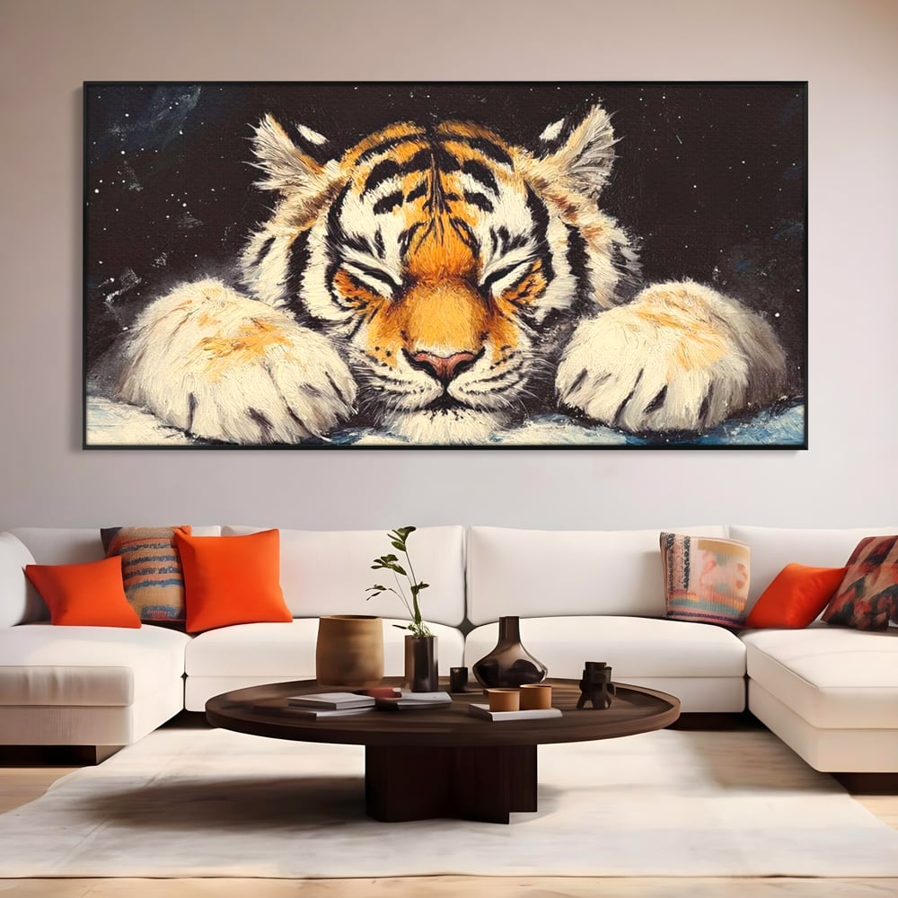 Tablou canvas cu tablou canvas cu pui de tigru dormind, in rama de aluminiu negru, pe perete intr-un living
